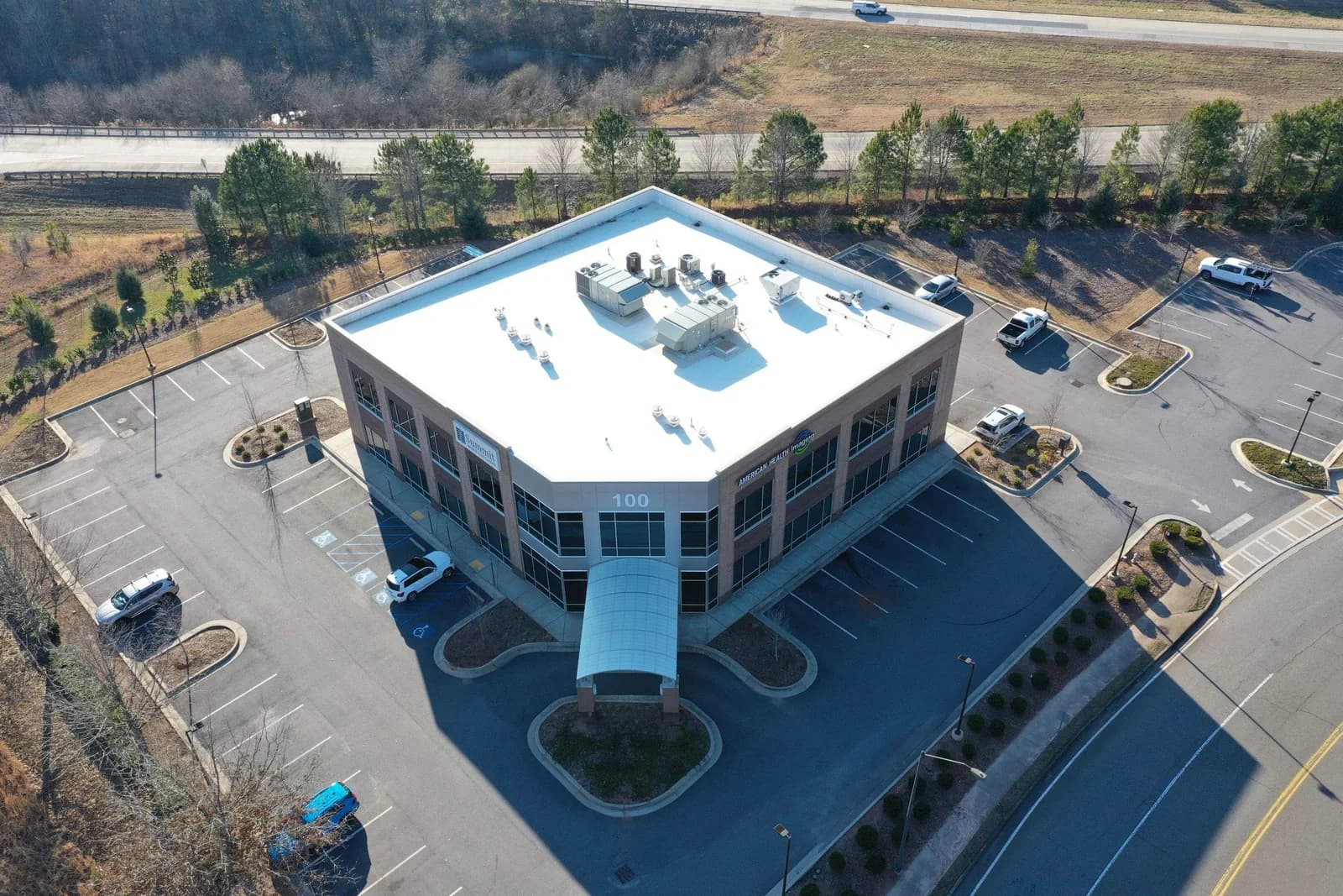 Reflective single-ply membrane roof on an Atlanta-area commercial property