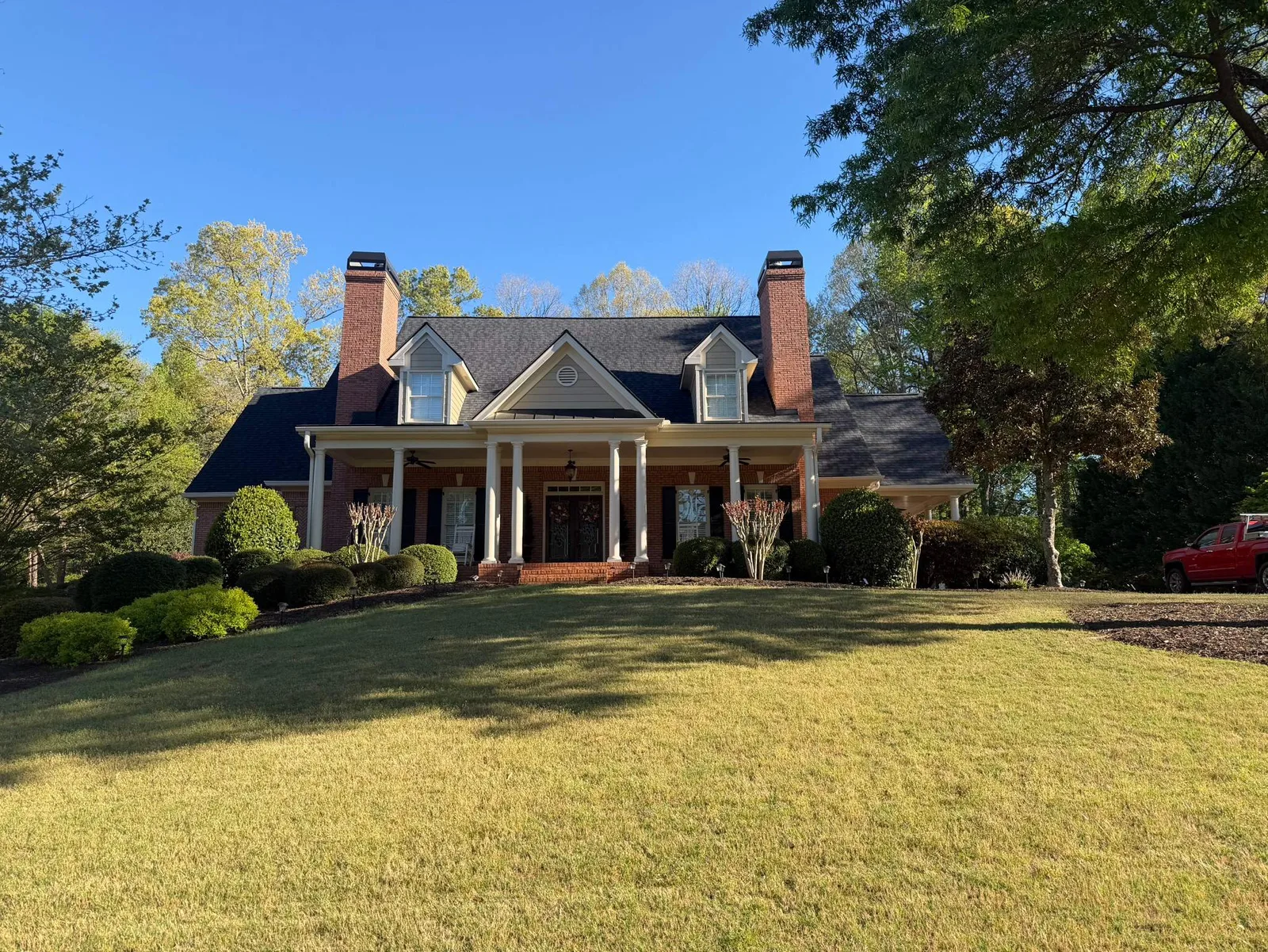 Emergency tarping on a storm-damaged North Georgia roof